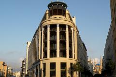 Beirut 41 Semiramis Building At Ancient Bab Idriss Gateway To Old Beirut At Weygand St and Abdul Hamid Karameh Street To Clock Tower In Nejmeh Square Place de L'Etoile With Mohammed Al-Amin Mosque Behind